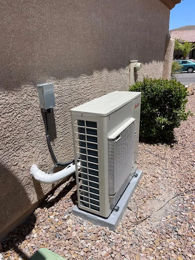 Residential air conditioning condenser unit in Shawano